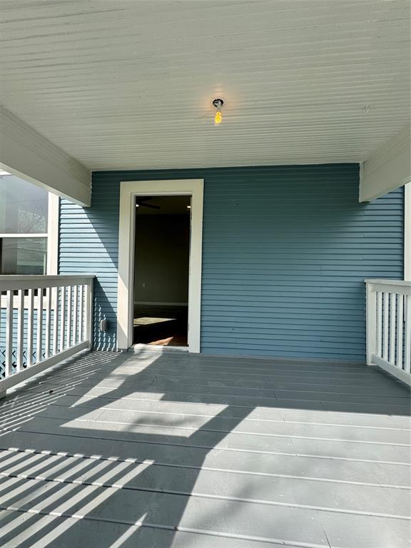 new porch rails and it also has a new light fixture now.