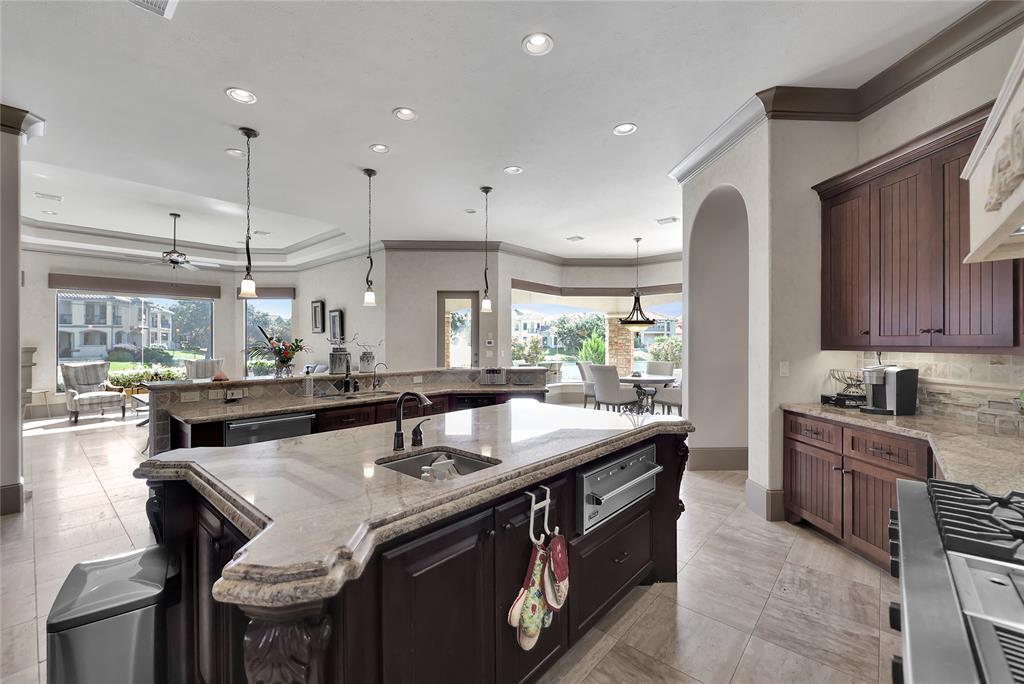 Gourmet Kitchen also offers an extended island with granite countertops for extra seating, recessed and under-cabinet lighting, a walk-in pantry, and High-End Appliances!