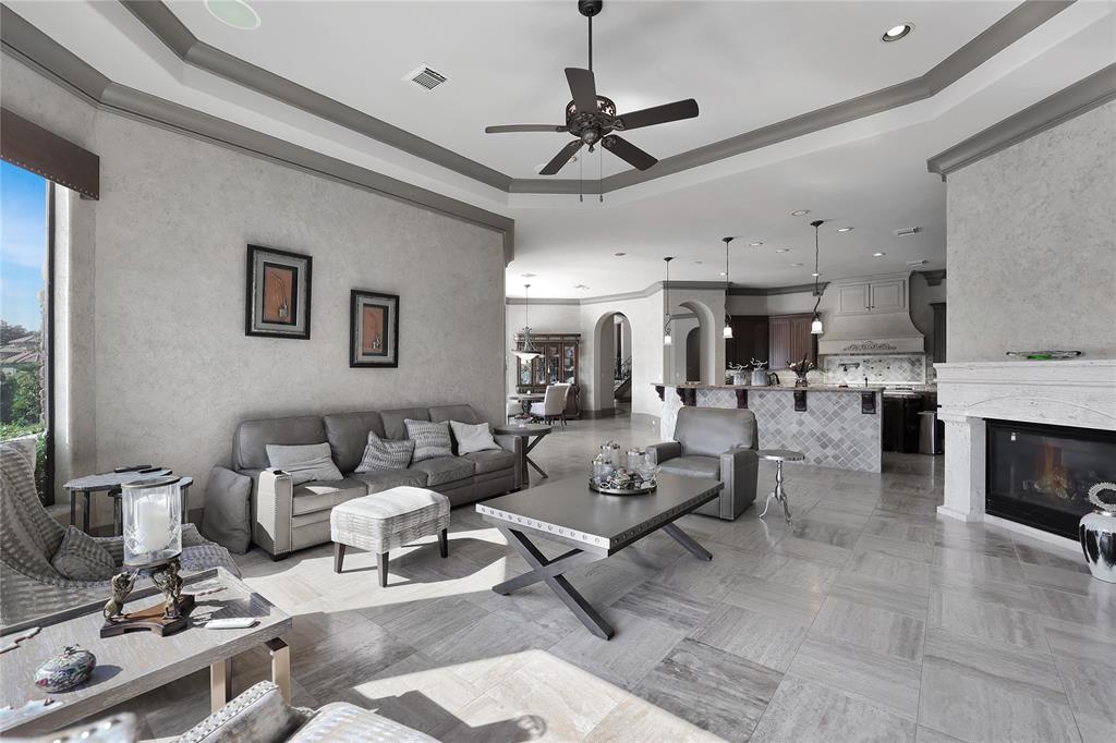 Alternate view of a family room with limestone fireplace