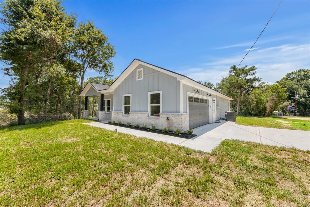 Over sized 2 car garage with concrete drive way