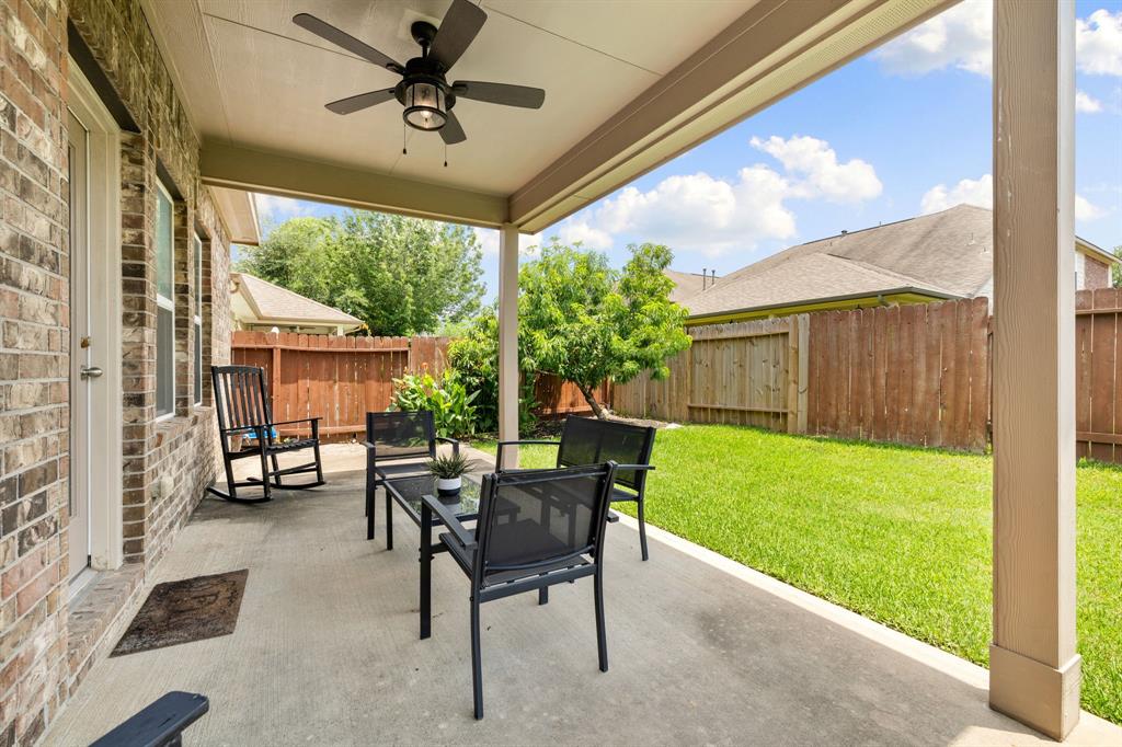 Come and see this spacious backyard with its beautiful covered patio. There is plenty of room for the kids to play and adults to relax! Perfect for your outdoor living space, patio furniture, bbq pit, and so much more. The possibilities are endless!