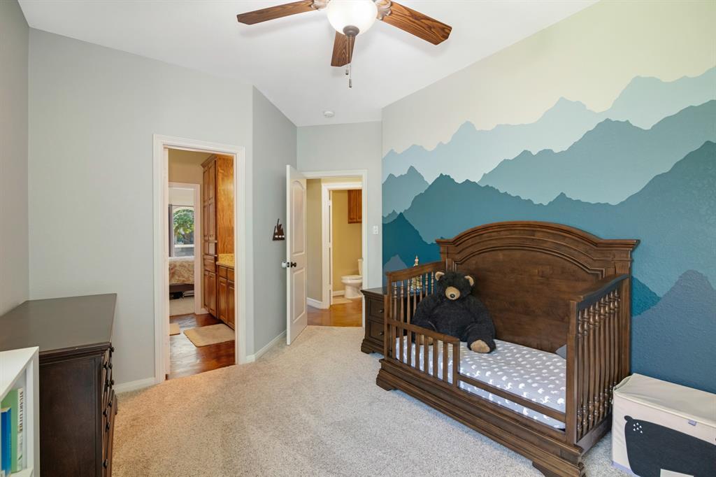 Enjoy your beautiful mountain view mural in this bedroom.