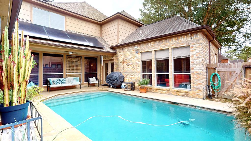 Another view of the bedroom and pool as well.