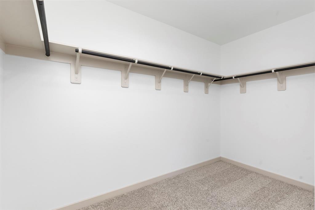 Huge Walk In Closet for all your storage needs!   This is only half of the Closet come and Visit the Model and let us show you the other half and all of are amazing New Energy Saving Homes!