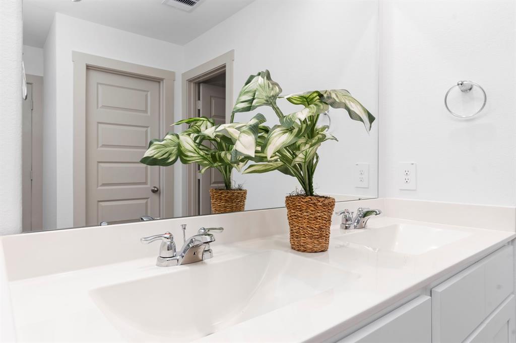 His and Her Private Sinks, Large Beautiful Shaker Bathroom Cabinets, Easy to care for Cultured Marble Counters and more!