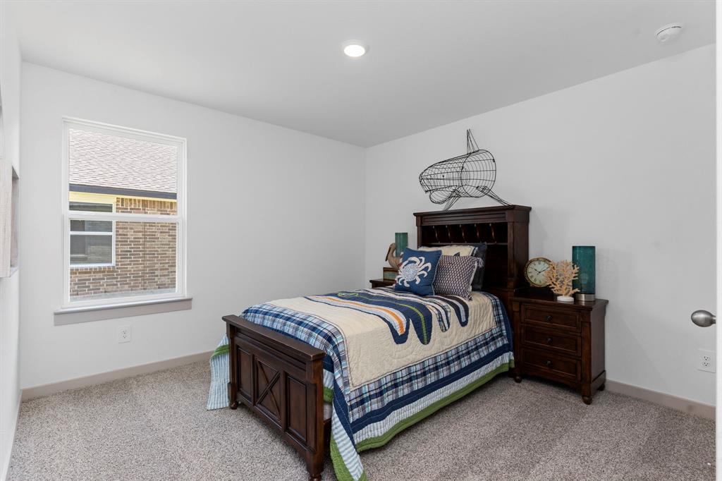 Guest Bedroom all tucked away from the Primary Bedroom and from the Main part of the Family Main Area for everyone privacy!