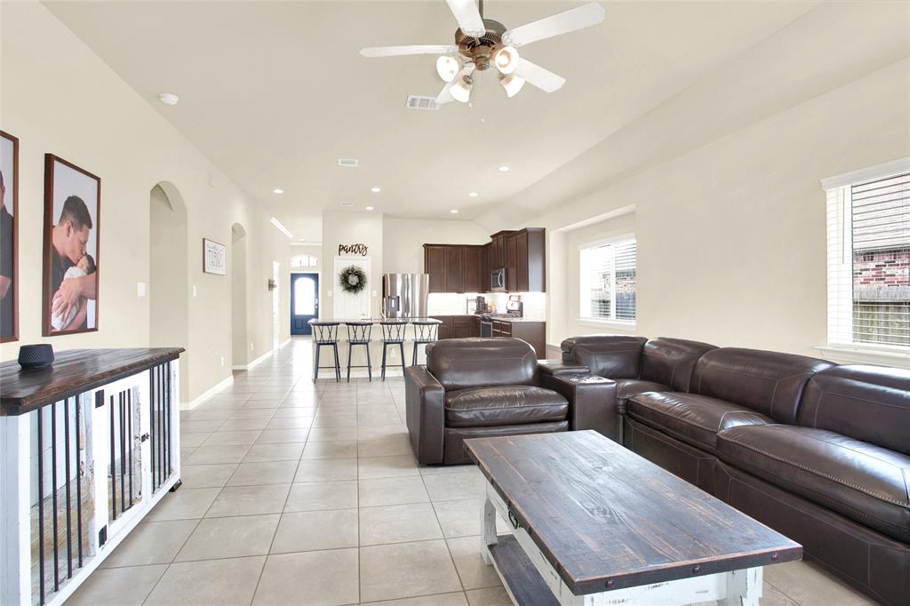 A look from the back door into the living and dining to the front door. Very spacious home.