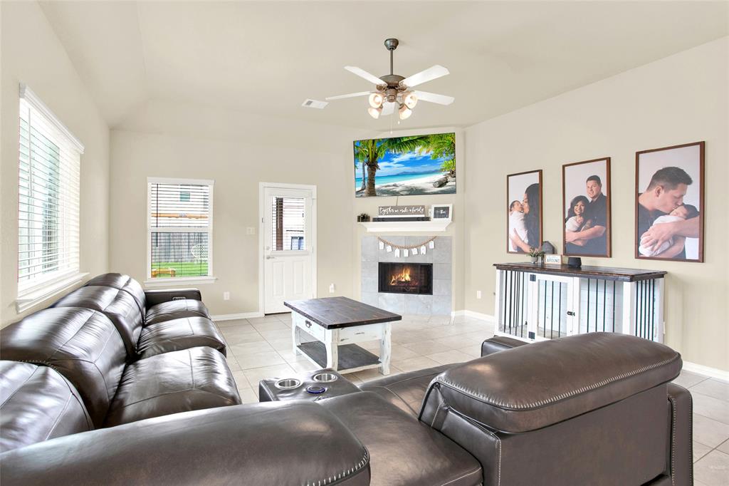 Super spacious living area with a real wood burning fireplace. Lots of natural lighting in this space.