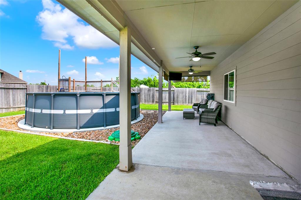 Extended back patio and cement pad in 2022 the entire length of the home.