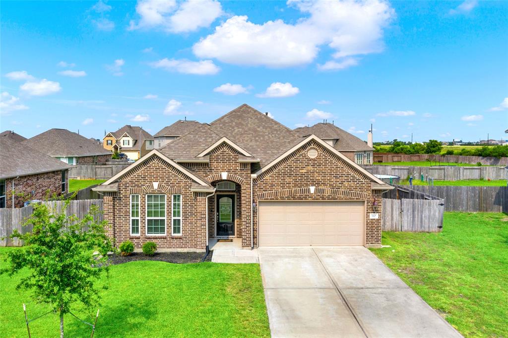 Your boat, toys, or trailer can fit on the side of the house with a wide gate entrance.