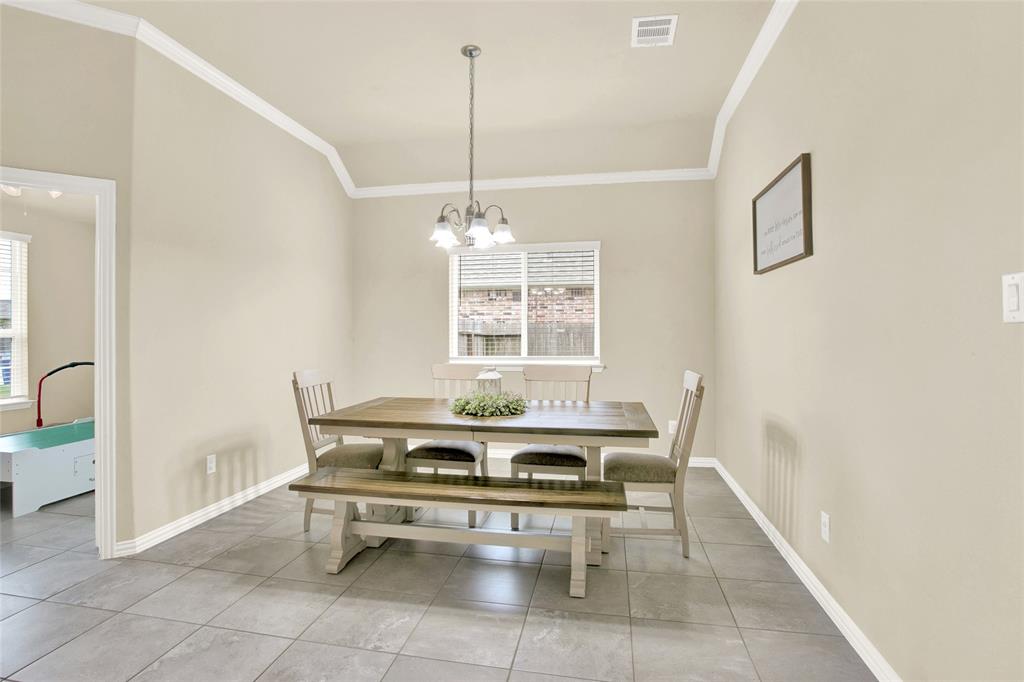 Nice sized formal dining between the study and the kitchen. Nice tile and crown molding througout the home.