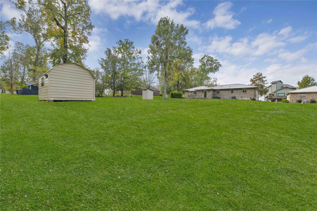 Rear property view. This home sits on 2 lots totaling 26,635 SF.