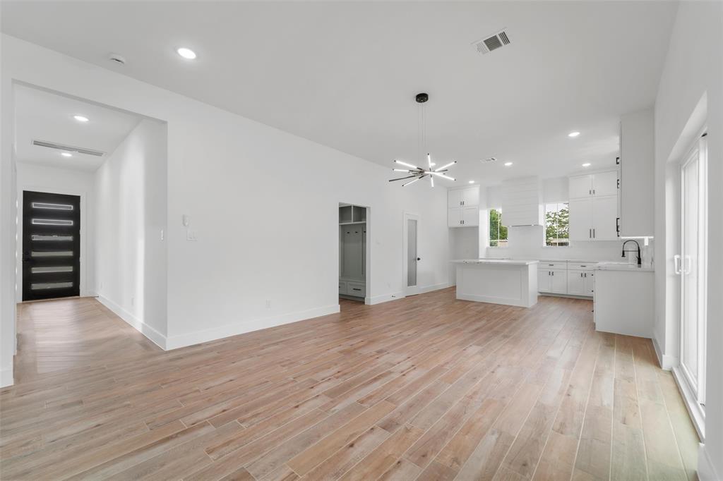 Find a spacious walk in pantry with plenty of shelving and even an outlet for your air fryer or coffee station.