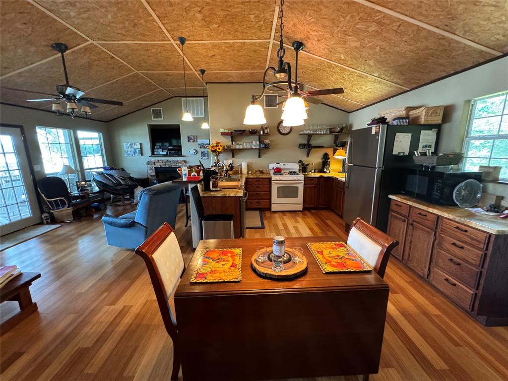 Living room, kitchen and dining area all in one big room with gas log fireplace!