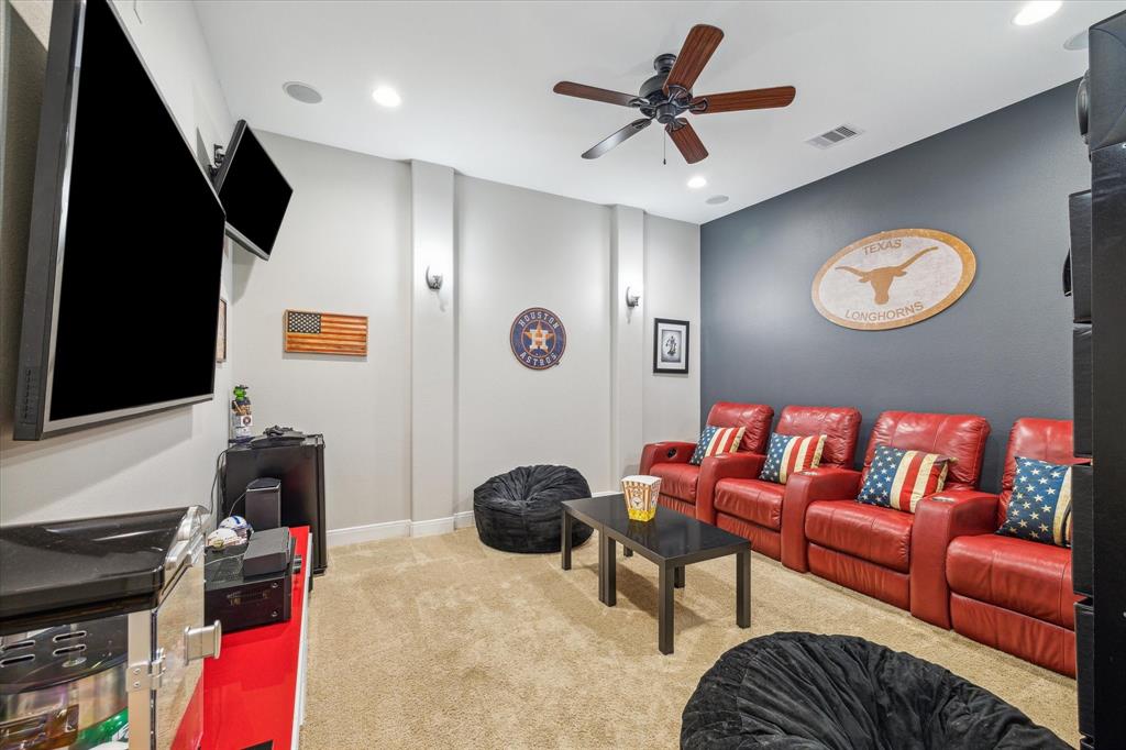 A cozy home theater room on the first floor