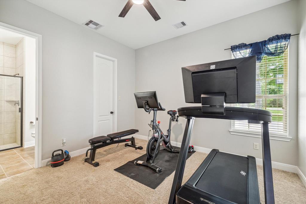 Second downstairs bedroom has its own private full bath and oversized walk in closet