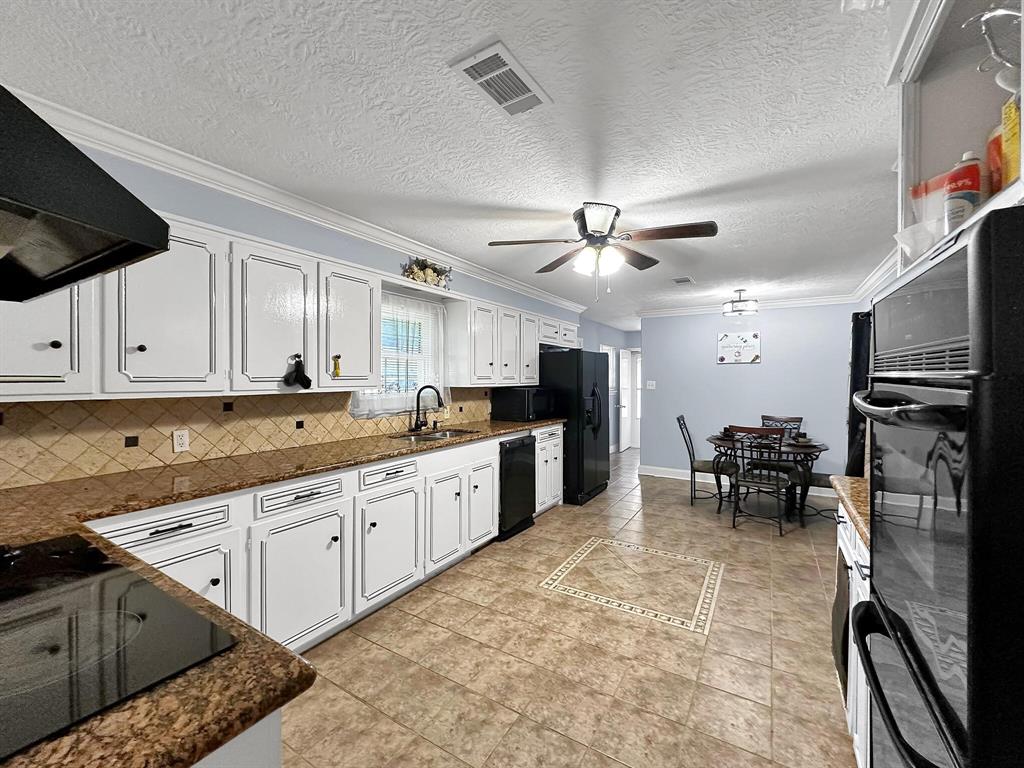 The home features a large open concept kitchen, ideal for cooking and entertaining.