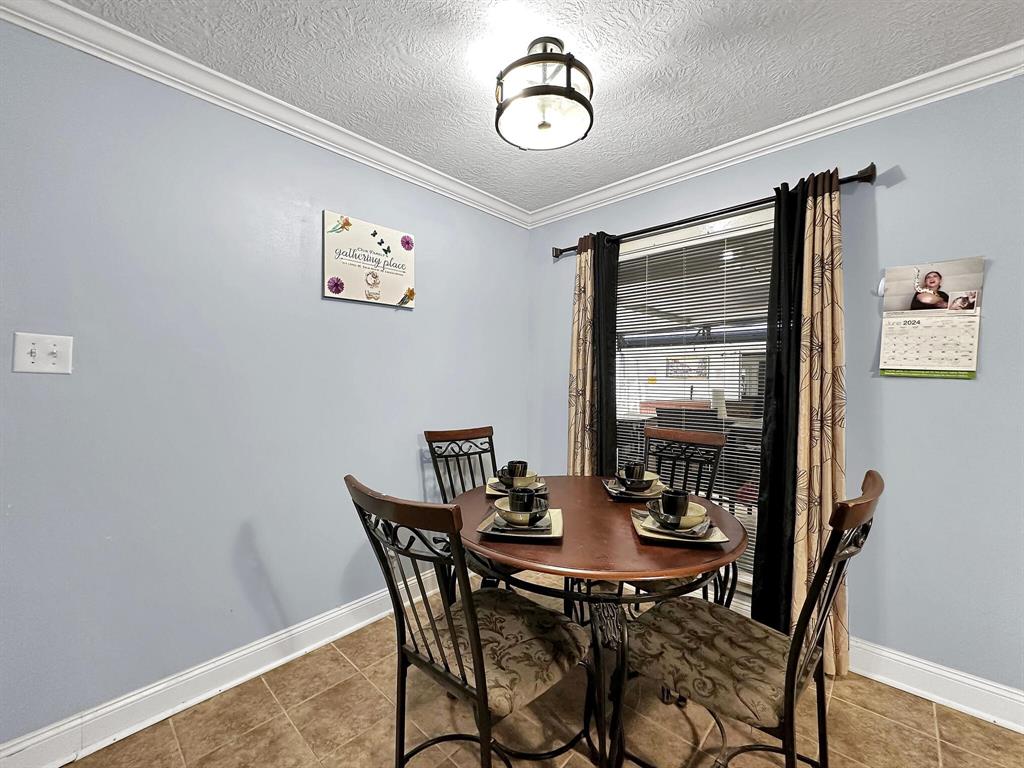 The kitchen includes the perfect breakfast nook, ideal for casual meals and morning coffee.