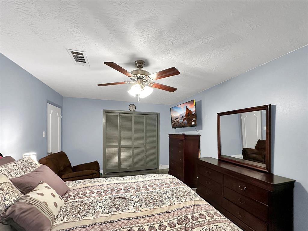 A spacious third bedroom provides ample room for comfort and versatility.