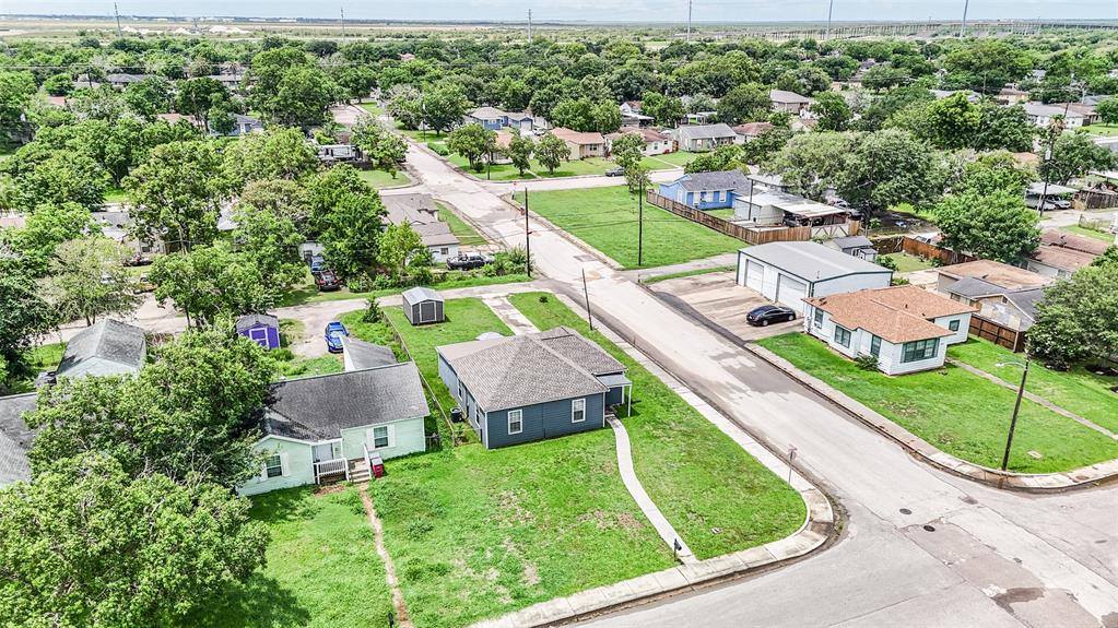 Aerial view of the home located on a corner lot