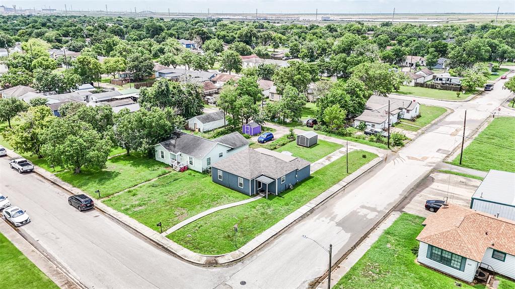 Aerial view of the home located on a corner lot