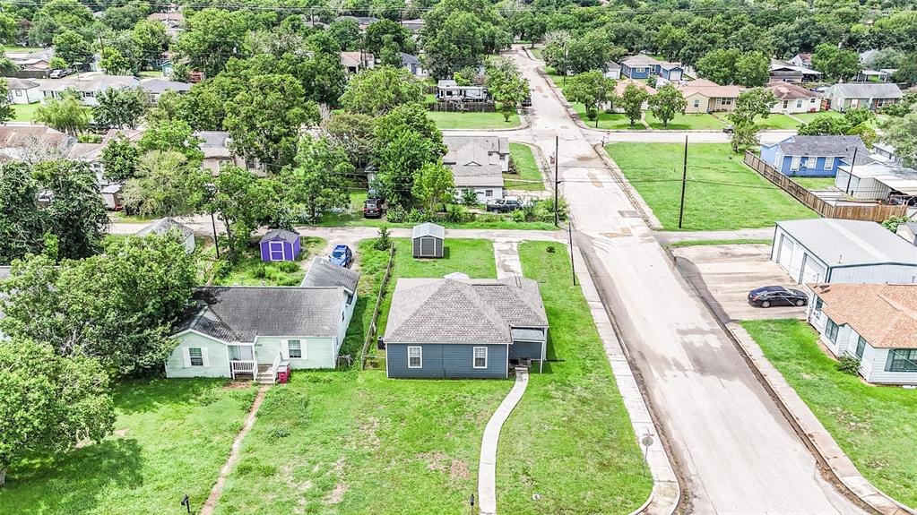 Aerial view of the home located on a corner lot