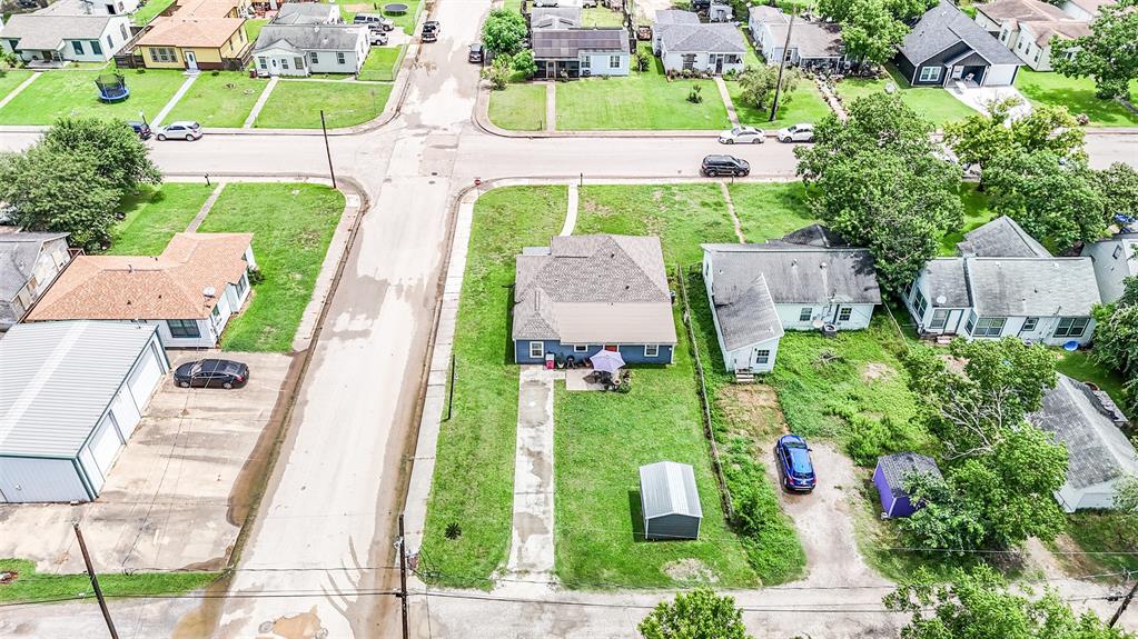 Aerial view of the home located on a corner lot