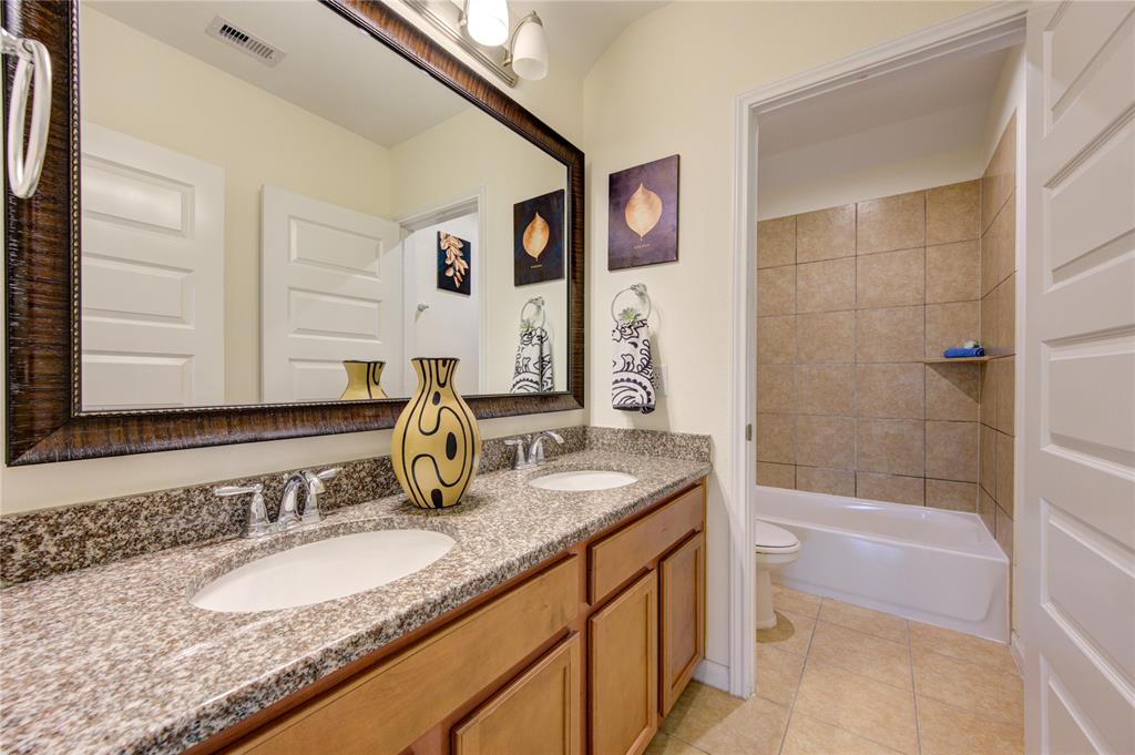 Full bathroom number 3 has dual sinks and separate toilet with combination shower/tub.  Great counter space and plenty of cabinets.