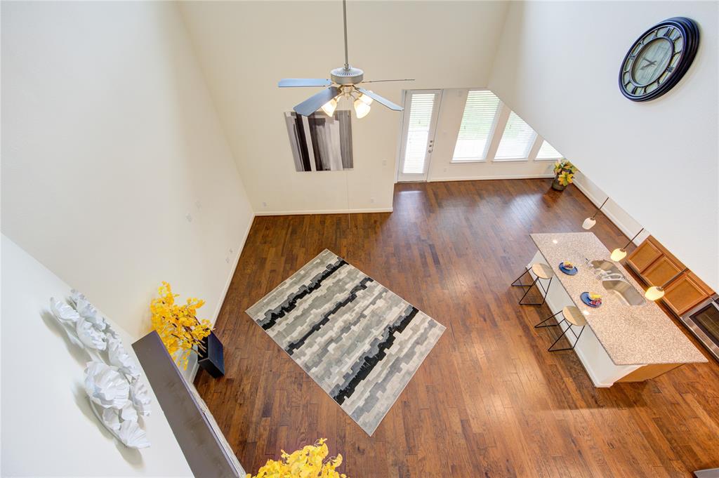 View from the upstairs gameroom overlooking the family room and kitchen downstairs.