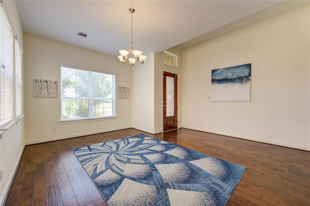 Formal Dining room with tons of natural light is extremely spacious.  You have plenty room for your dining suite here.