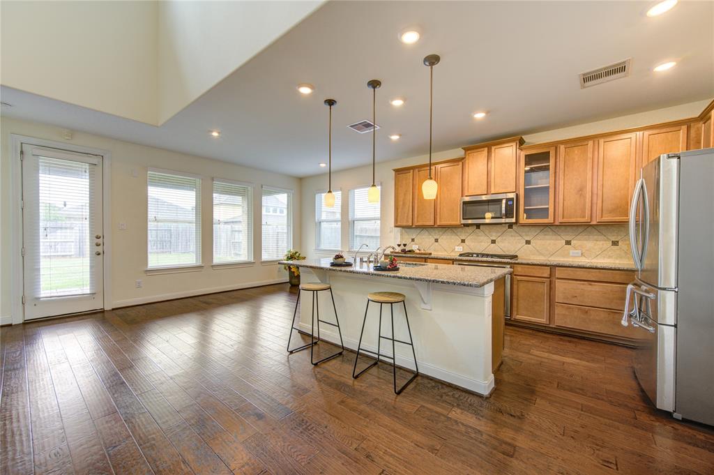 This entire home is light, bright and inviting.  The kitchen is open to the family room.