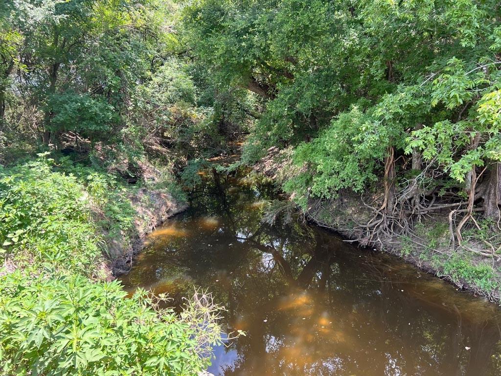 Small amount of Floodplain at wet weather creek. See attachments for Flood map.