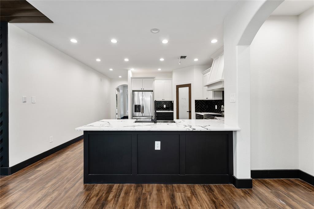 Gorgeous granite countertops and recessed lighting.