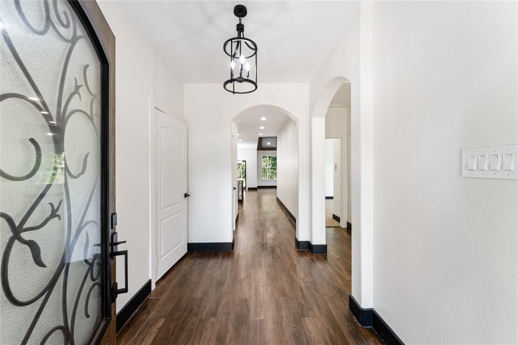 Stunning front door, upgraded light fixture and light and bright tones make this home feel welcoming.