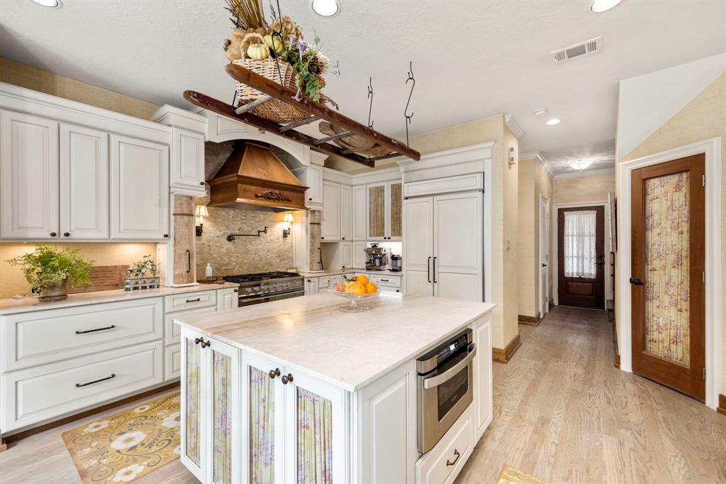 Additional view of the kitchen including the passageway to the \