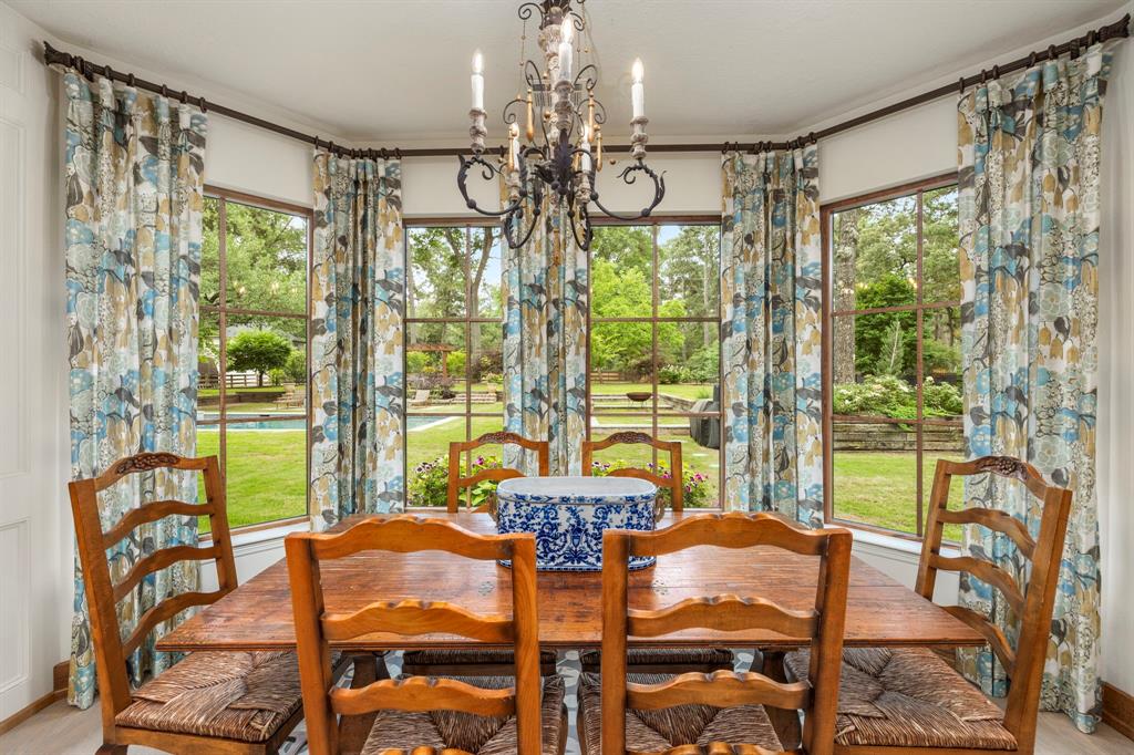 Enjoy morning coffee in the natural light and soothing pool and lawn views. A great gathering space for family and friends.