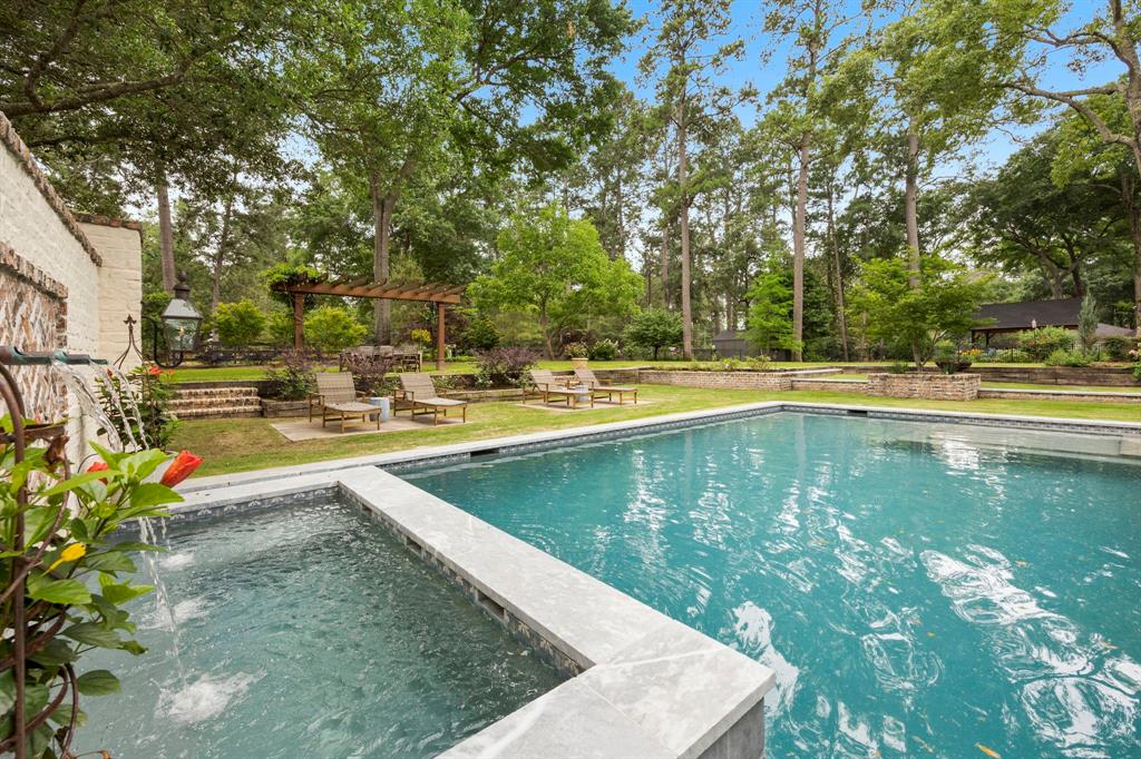 The front of the property is stunning; but the backyard spa-like retreat is breathtaking! Enjoy entertaining or quiet time pool side, soaking in the spa or dining under the sunset.