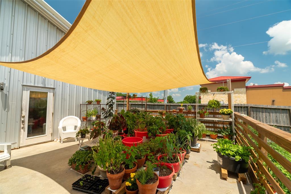 1610 N. Park St large patio for a container garden or a dance!  This space is waiting for your imagination!