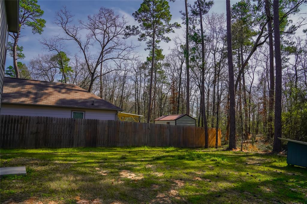 Partially fenced backyard with no back neighbors!