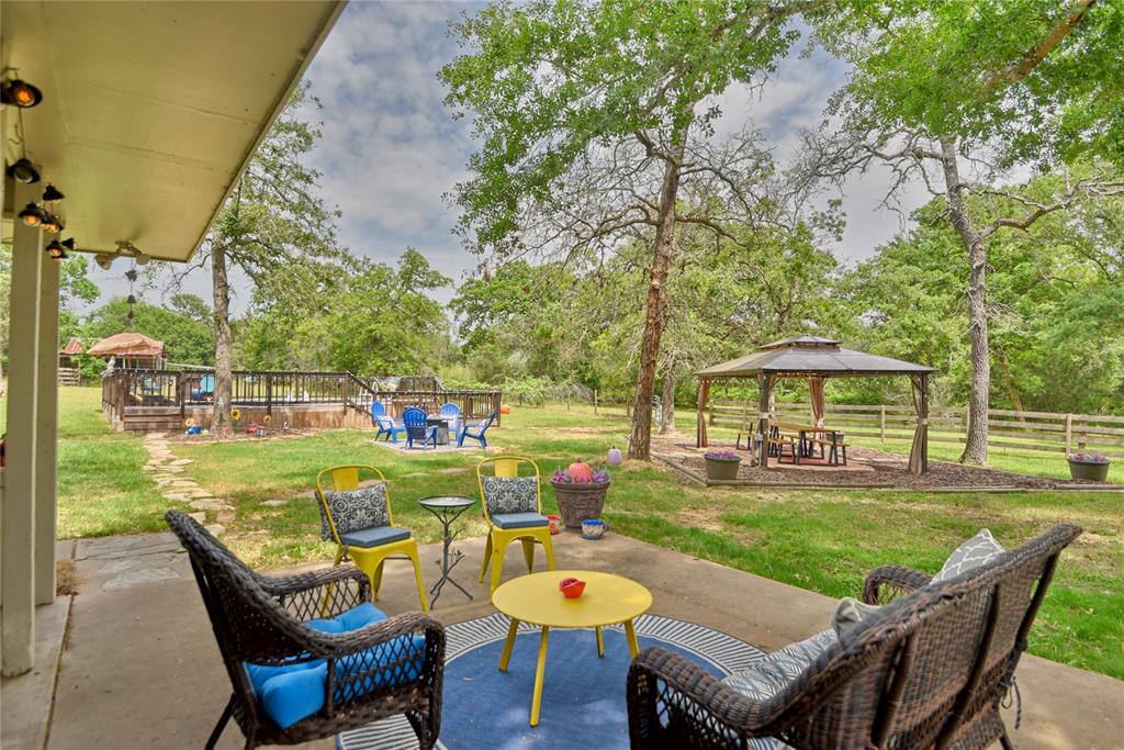 Lovely sitting area out back  - multiple seating areas make entertaining a breeze!