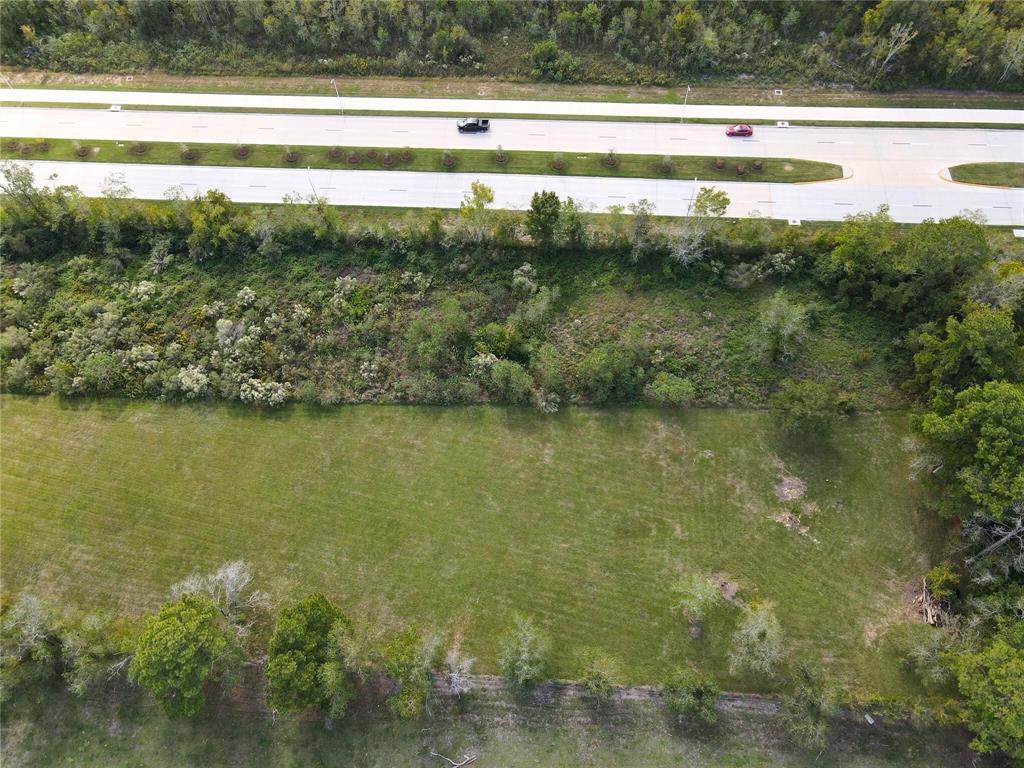 You can check with the city to see if you can put a driveway near the break in the median to allow easy access in both directions.