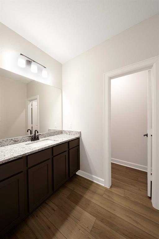 Step into the luxurious en-suite bathroom, where a sleek vanity offers both style and functionality, while a separate tub and shower combo provide the ultimate in relaxation and convenience. With its elegant design and spacious layout, this private oasis is a sanctuary for rejuvenation.