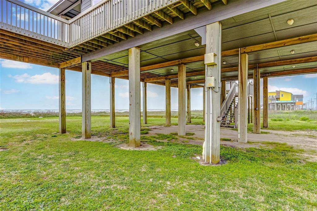 The spacious 90\' wide lot includes RECENT RV connections. Whether you’re looking for a personal retreat or a lucrative Airbnb investment, this property offers the perfect blend of modern comfort and beachfront charm. New breaker box.