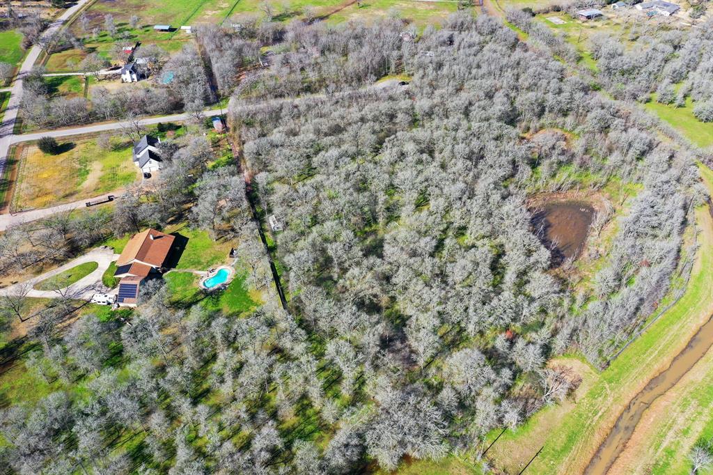 Aerial perspective of the neighboring homes.