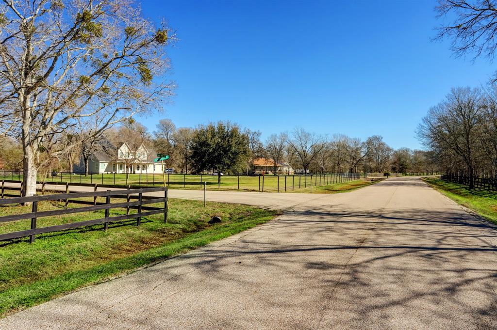 The intersection of Queen Anne court and Gainsborough Drive. Pecan Hills showcases spacious lots with expansive acreages , native trees and sprawling green pastures under the vast Texas skies.