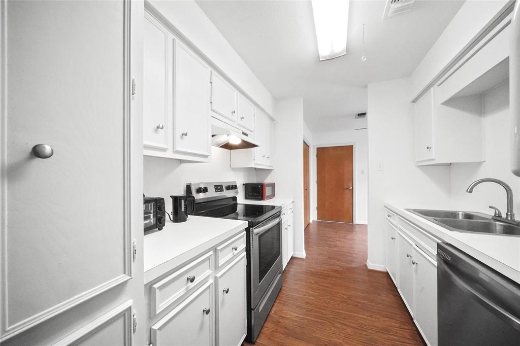 Modern kitchen with neutral cabinets.