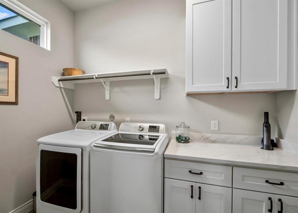 Utility Room has added storage cabinets