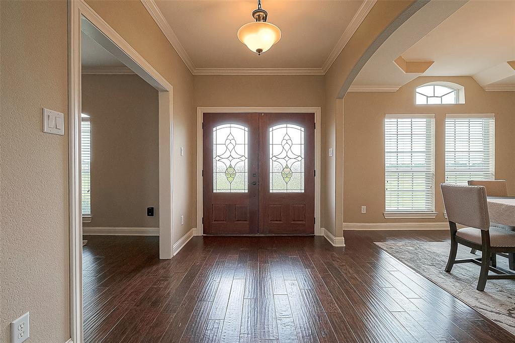 Enter to gleaming real hardwood floors that provide an inviting atmosphere to this lovely home.