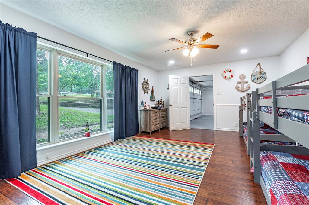 guest bedroom 3 overlooks the front of the home and is connected to the game room