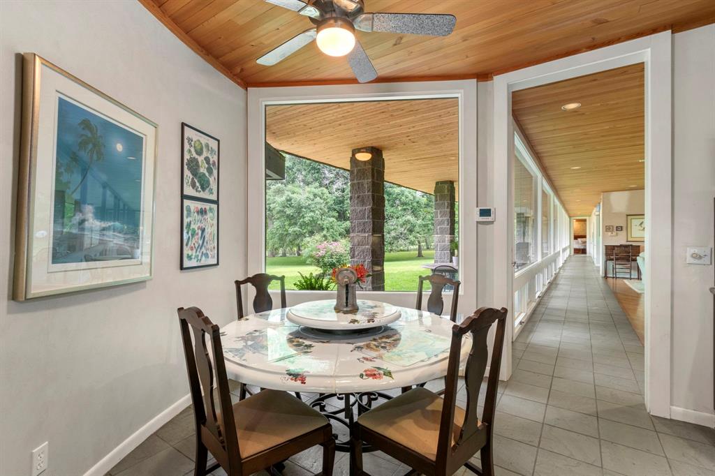 The kitchen and breakfast area opens to the great room and dining area allowing you to entertain guests with ease. A French door leads to the extended outdoor living space.